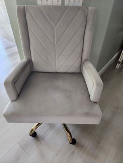Gray velour office chair. 99% New