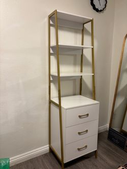Tall bookcase with three wooden drawers