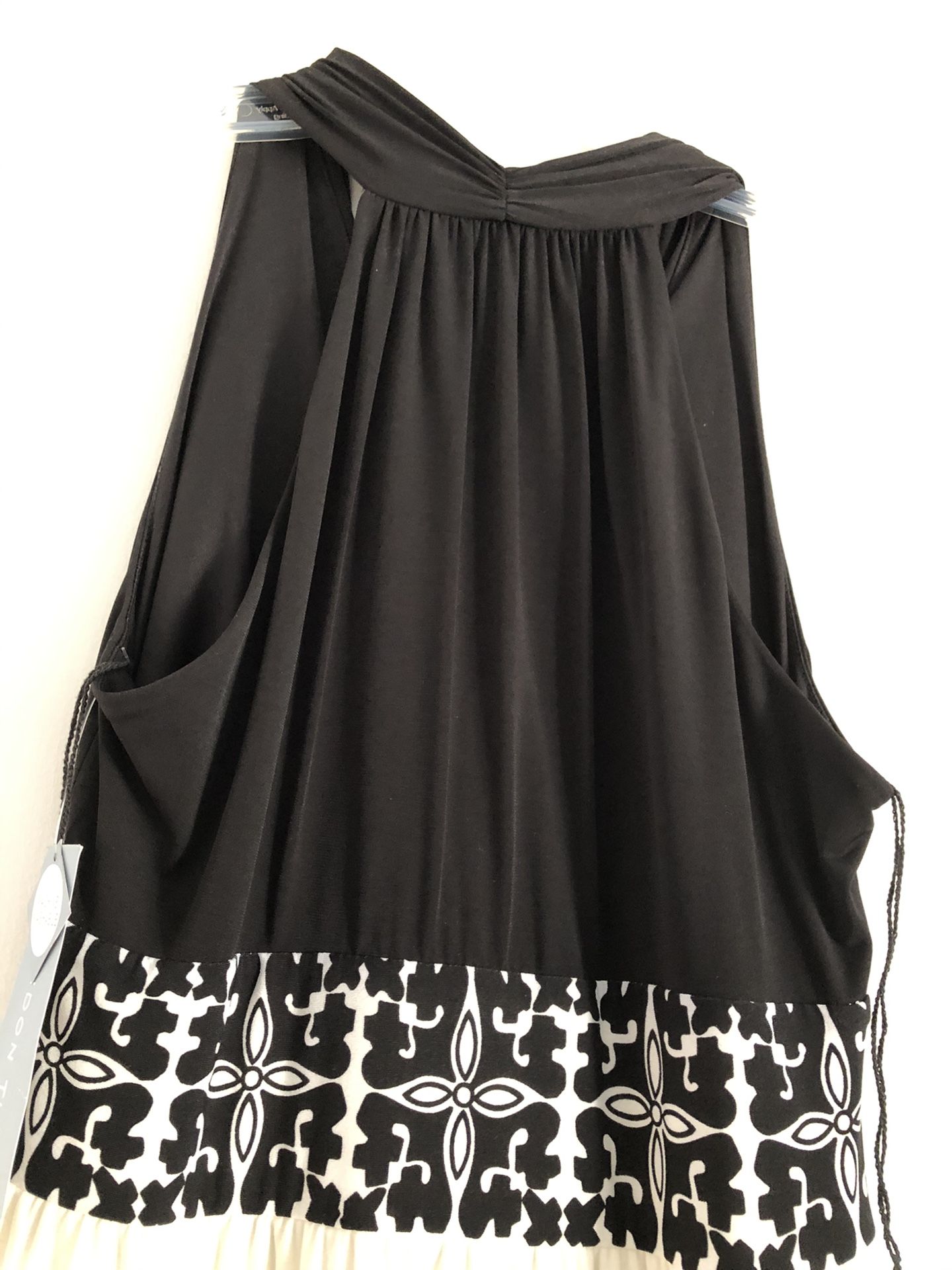 Beautiful black and white dress .