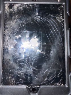 Cracked iPad 9th gen with case.