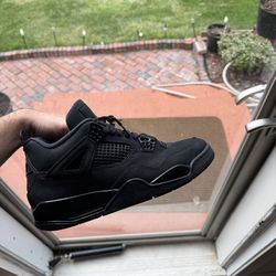Black cat 4s size 11