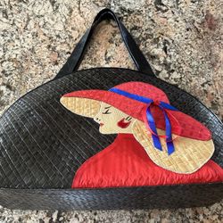 Woven Straw Bag accented with a Beautiful Lady wearing a big hat and satin shirt 