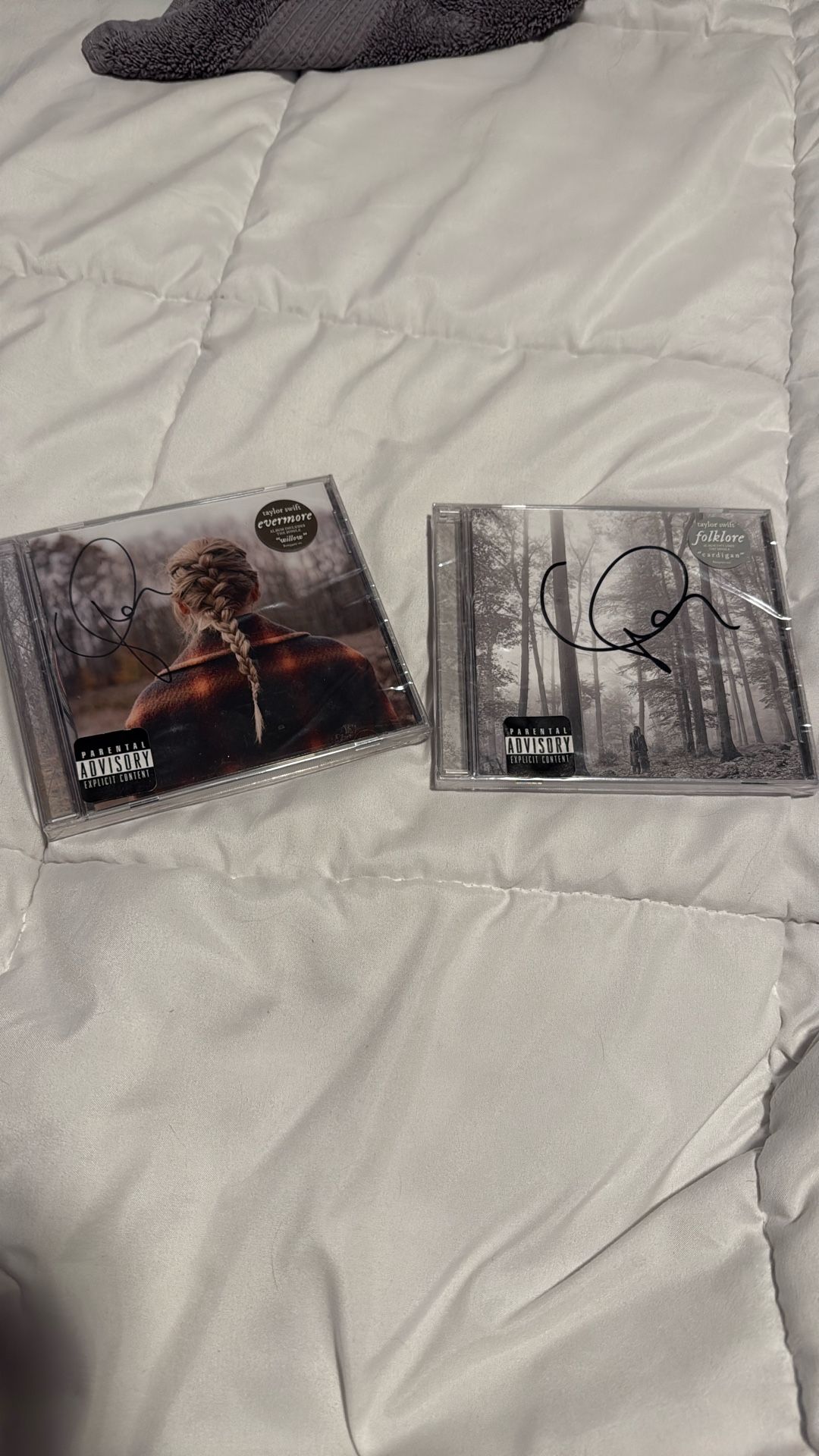 Taylor Swift Evermore and Folklore Signed CDs