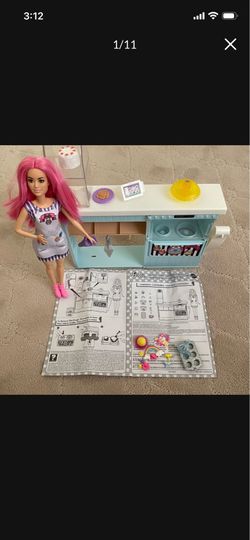 Two Barbie play sets