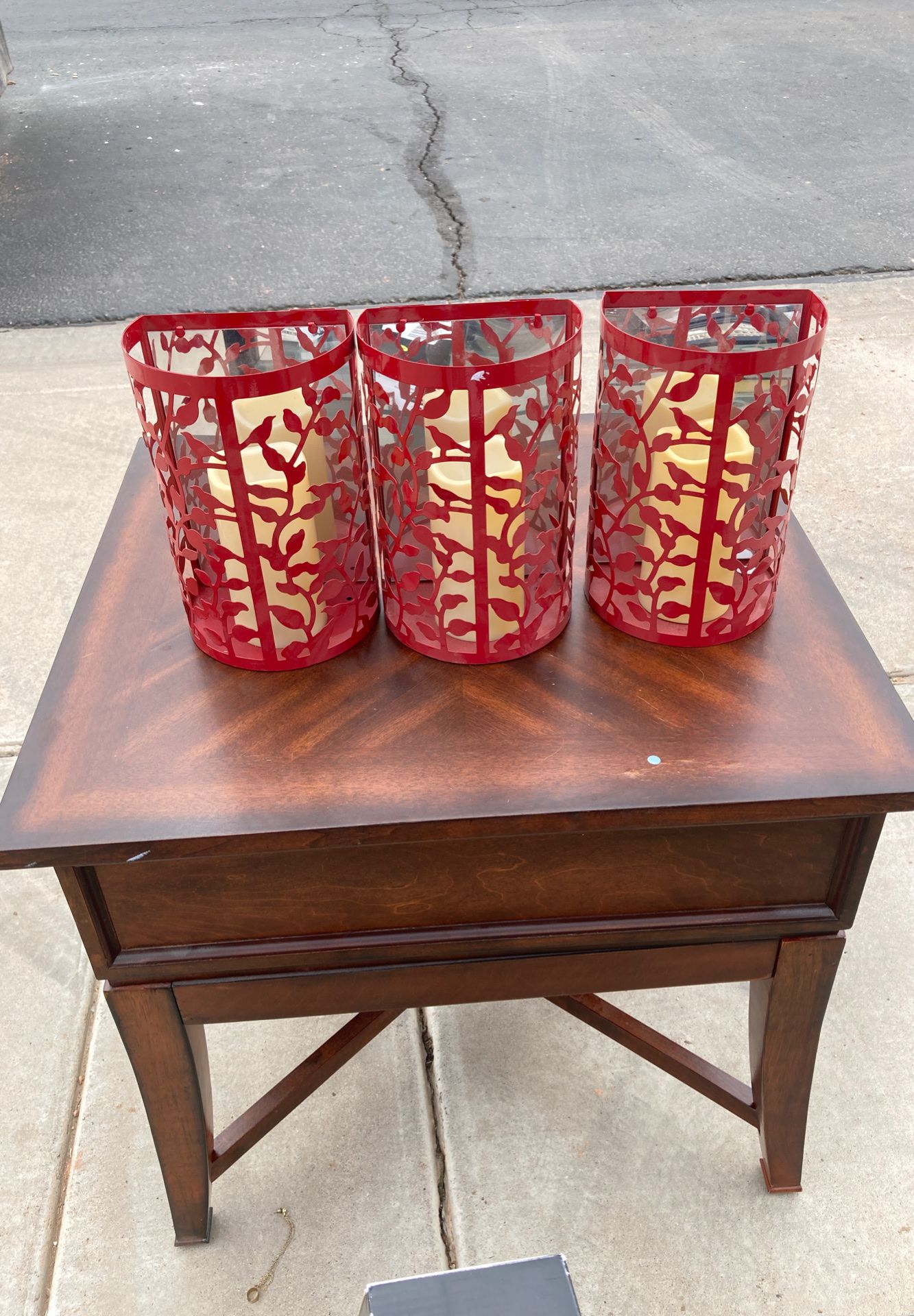 Three red candle sconce