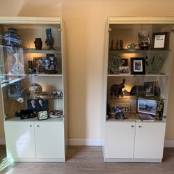 2 Glass display cases with lighting. 