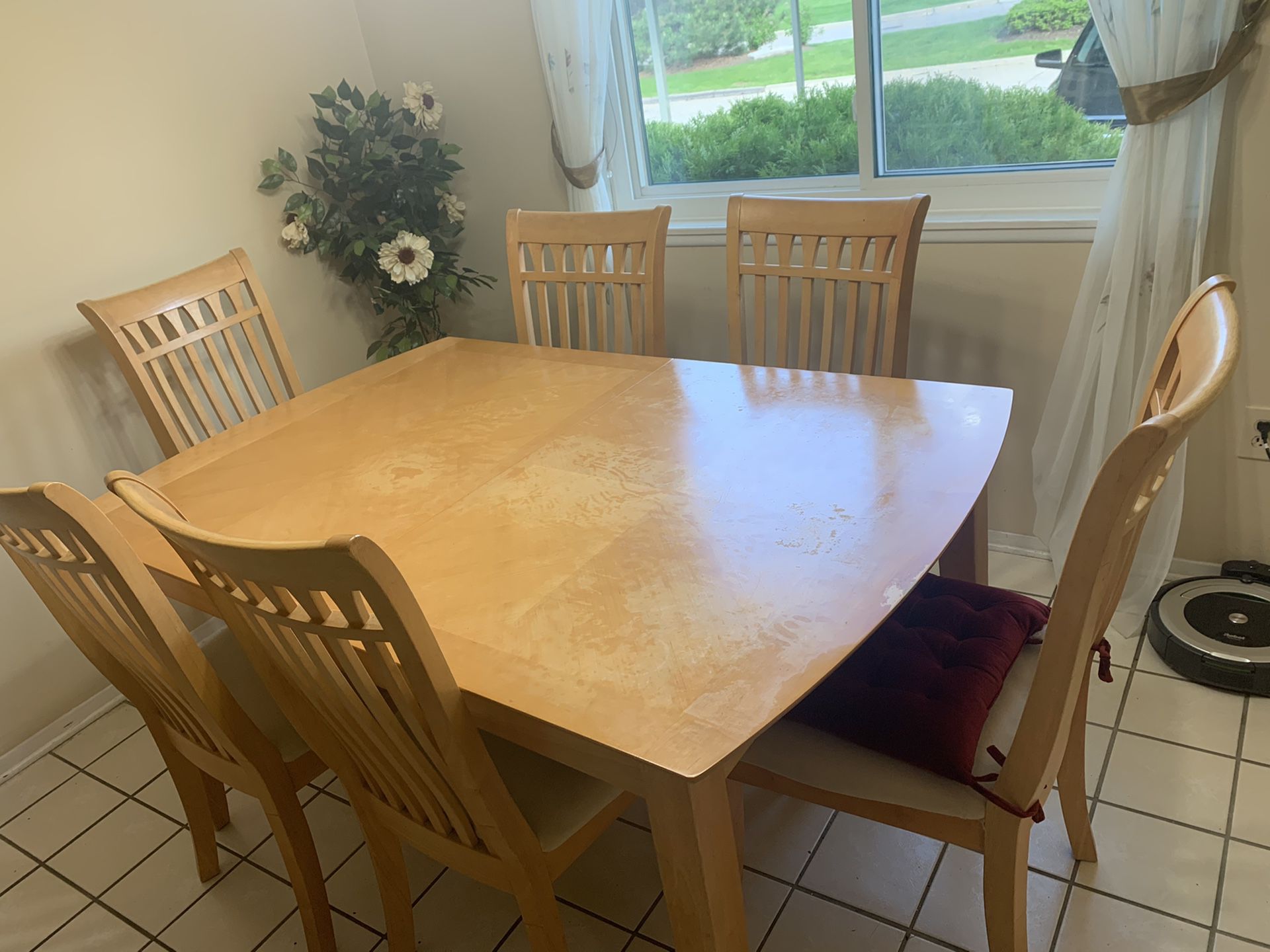 Wooden table with 6 chairs