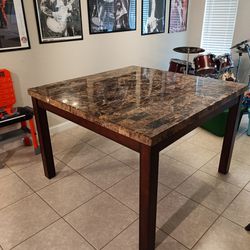Granite Dining Table And 4 leather Chairs 