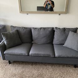 Small Gray Couch With Two Cushions