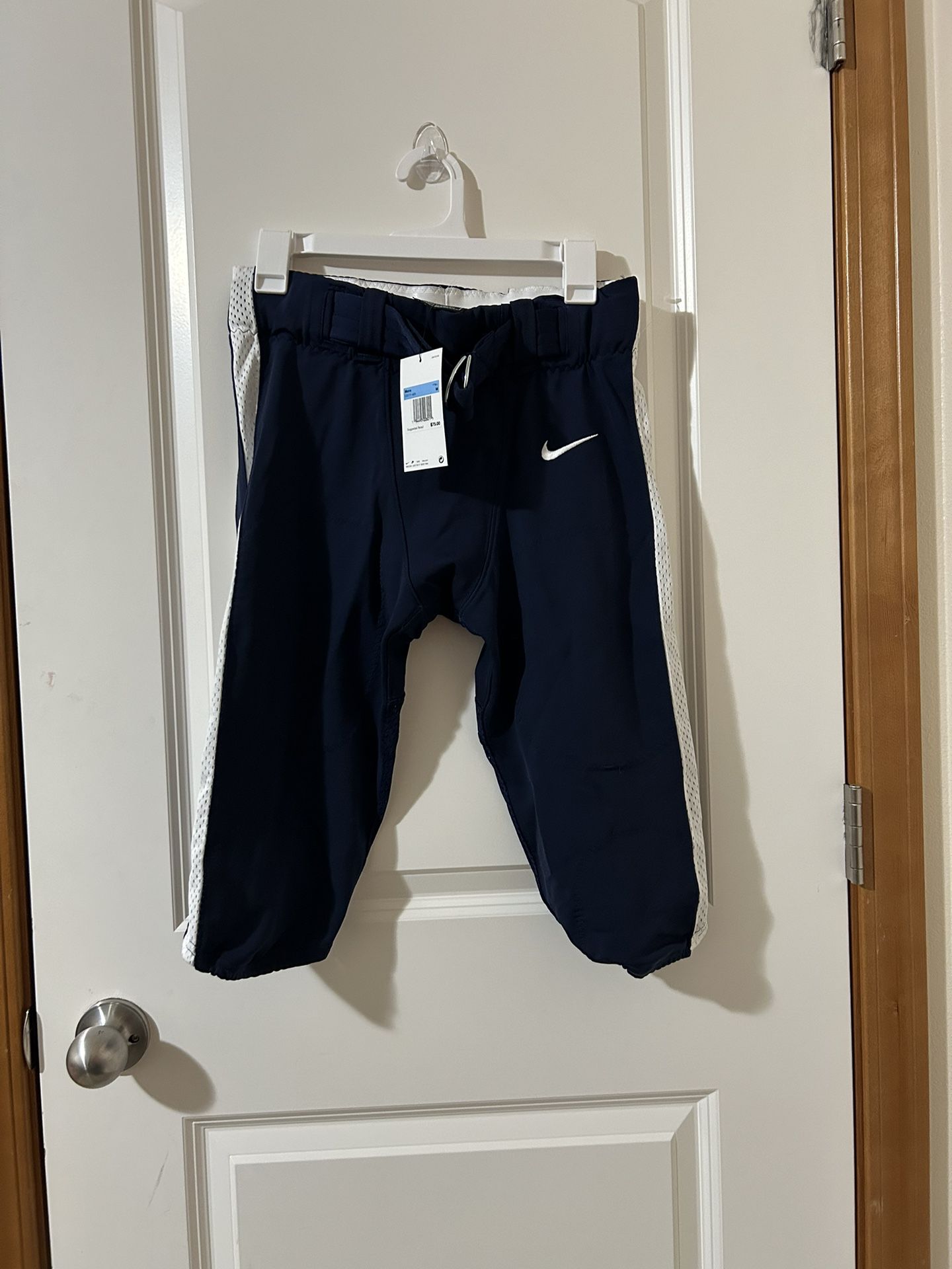 Nike football pants, New, Medium, navy blue, retails at $75