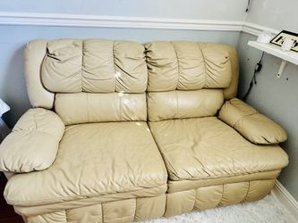 Beige Leather Reclining Loveseat