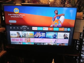 55" RCA w/TV stand can use a fire stick comes with glass stand frame and Remote control