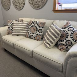 Ashley Fabric Couch With 5 Pillows