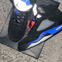 Racer Blue 5s, Size 13. Used Good Condition. Box Slightly Damaged 