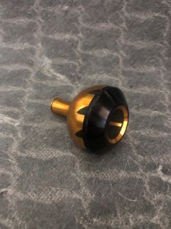 Penn slammer iv aluminum gold knob