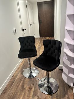 Tufted black bar stools