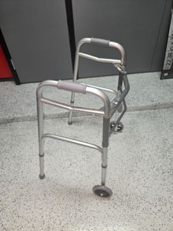 Walker with an extra set of glide caps