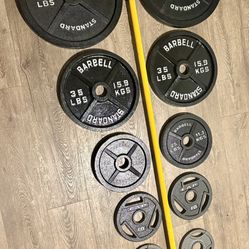Beautiful BRAND NEW  Olympic Equipment: Bar And Full Set Of Weight Plates. Total Of 290 lbs