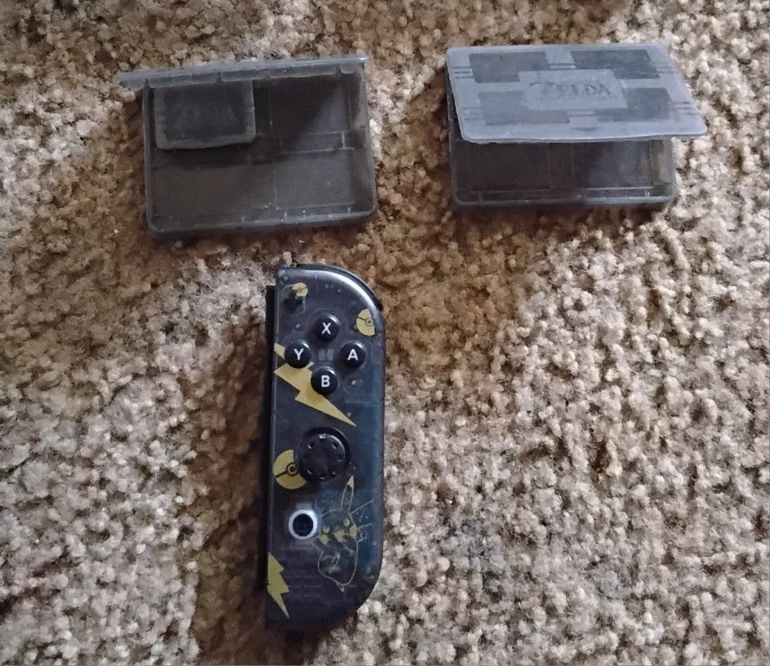 Nintendo Switch Joy Con And Game Cases