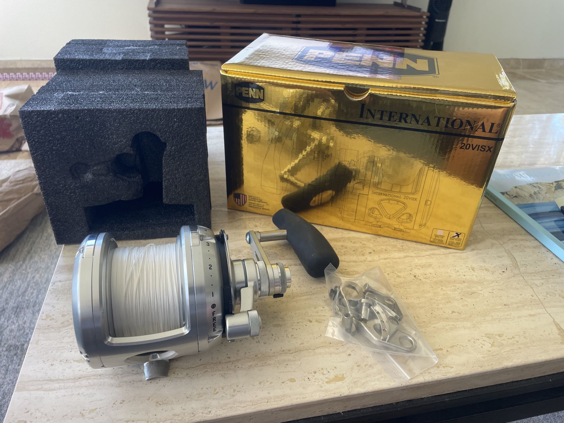 Penn International 20 VISX fishing reel never used, with spectra