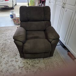 Brown Recliner with easy and out feature. $75