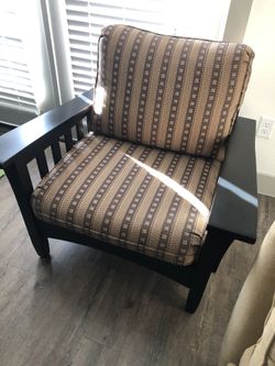 New Ethan Allen chair with ottoman black. Modern elegant design and look. Living room or bedroom is a perfect place. Cherry wood Original price $1500.