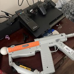 PS3 Slim Bundle - 35+ Games, Move Sharp Shooter & Accessories