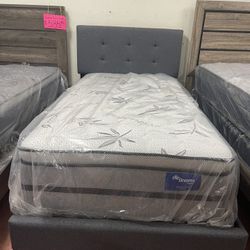 Twin Size Bed With New Mattress Included.
