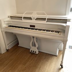 Vintage winter Company white piano