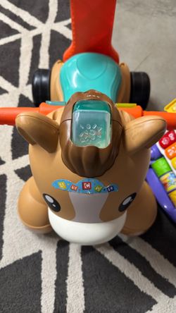 Fisher-Price Walk Bounce & Ride Pony, Infant to Toddler Musical Walker and Ride-on Toy
