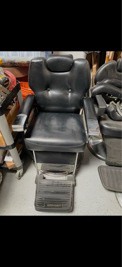 Four Keller barber chairs