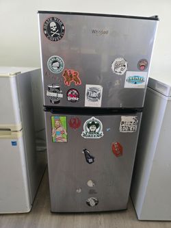 Medium-sized refrigerator for sale; works very well.
