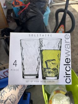 Brand new set of 4 glasses