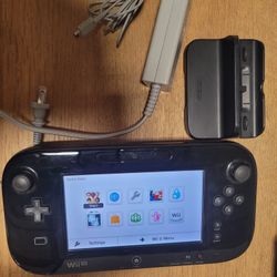 Nintendo WiiU + 151 Games
