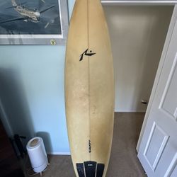 Rusty mid length 7’4 