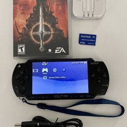 Sony PSP 2001 Bundle Charger, Game, Earbuds, Memory And Wrist Strap Included