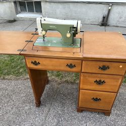 Antique Sewing Machine And Desk