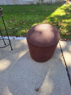Small oval storage ottoman