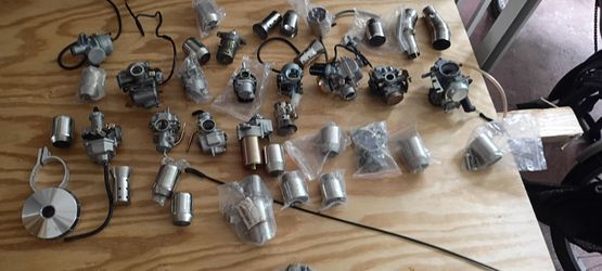 Large Lot of Carburetors and Engine Parts