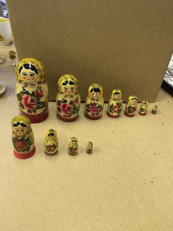 2 Sets Of Russian Dolls