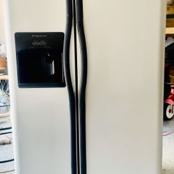 Frigidaire Side-by-Side Refrigerator with External Ice and Water Dispenser.