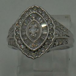 14kt white gold engagement ring 4.8 grams size 7 w 1 carat of diamonds total . 1 marquise diamonds approximately 0.10-0.12 pts ; 2 round diamonds 0.05