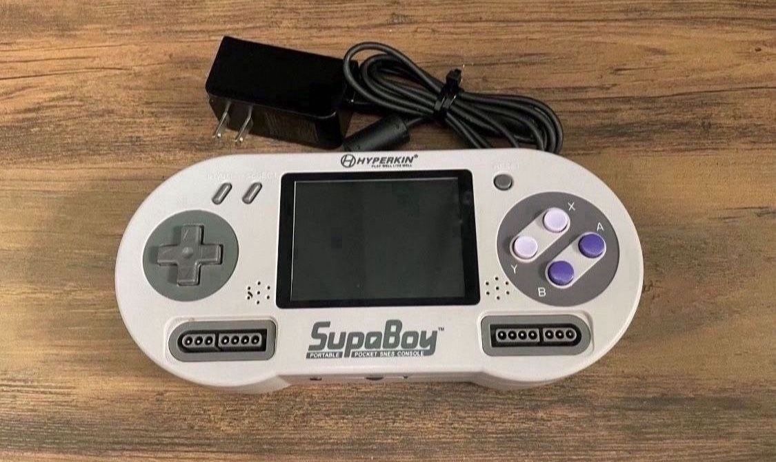 Hyperkin SupaBoy Portable Pocket SNES Console And Games