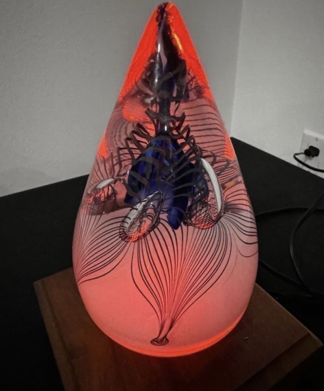 vintage paperweight designed by Adam Jablonski is a stunning piece of crystal art from Poland. The multicolored design lights up, adding a touch of el