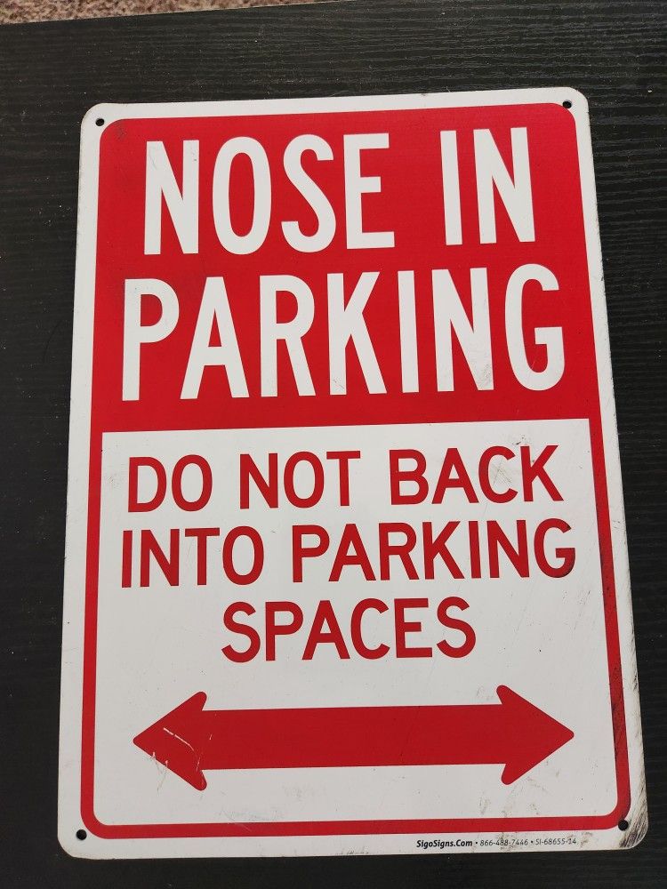Metal Nose In Parking Sign