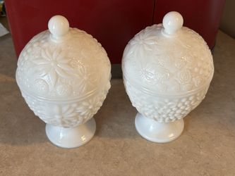 Set of 2 matching Avon Milk Glass Egg Shaped Covered Compote Candy Dish, featuring a floral pattern. Roses and daisies 