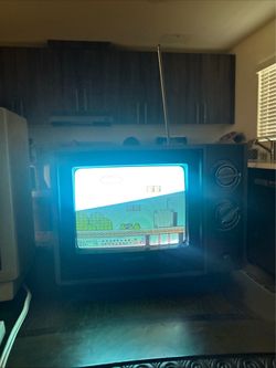 Vintage CRT Television with Antenna