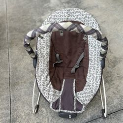 Baby Seat , like baby Bjorn with buttons for vibration and music