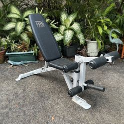 MARCY  PRO  TRAINING  SYSTEMS  ADJUSTABLE  BENCH  :  Inclines / Declines / Goes Flat With Leg  Curl Attachment    •  BARS  •  PLATES  •  DUMBBELLS •  
