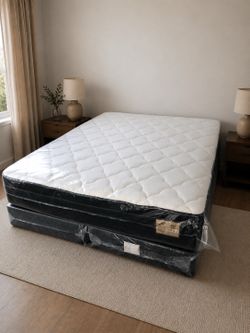 Queen regular mattress and box spring new